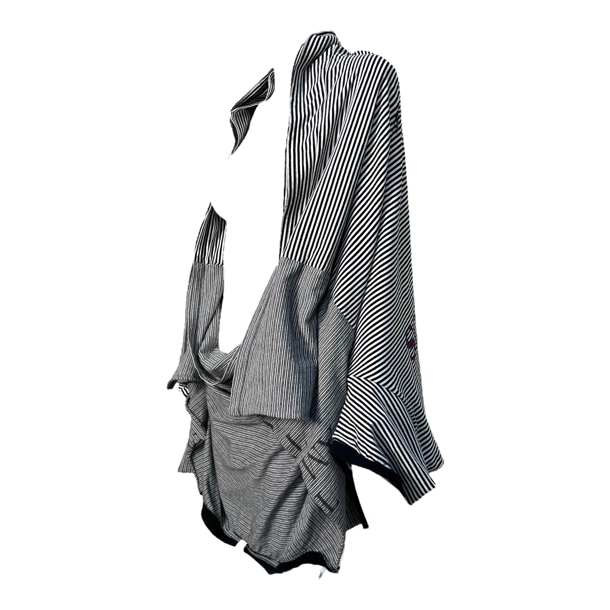 From Japanese luxury designer Jun Takahashi's brand Undercover Co., Ltd's Spring 2006 Ready To Wear collection. Featured on the runway. Avant-Garde deconstructed striped black, grey and white striped cotton knit tee. The attached tee shirts have