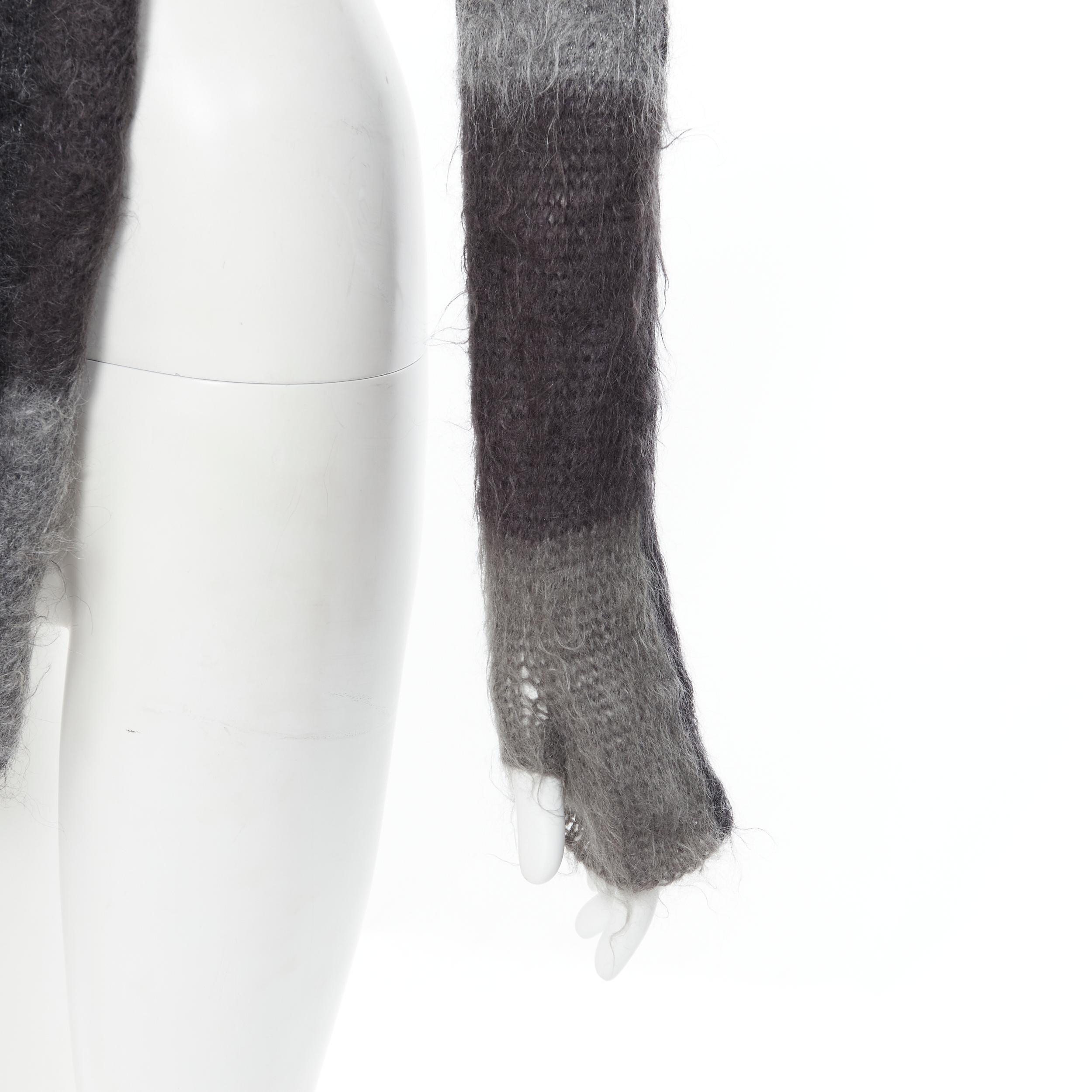 UNDERCOVER grey black check wool knit fingerless glove extra long scarf 
Reference: CAWG/A00174 
Brand: Undercover 
Material: Wool 
Color: Grey 
Pattern: Check 
Extra Detail: Attached open finger glove scarf. Extra long scarf. 

CONDITION: