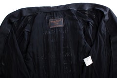 Undercover, semi-transparent jacket with fringes.