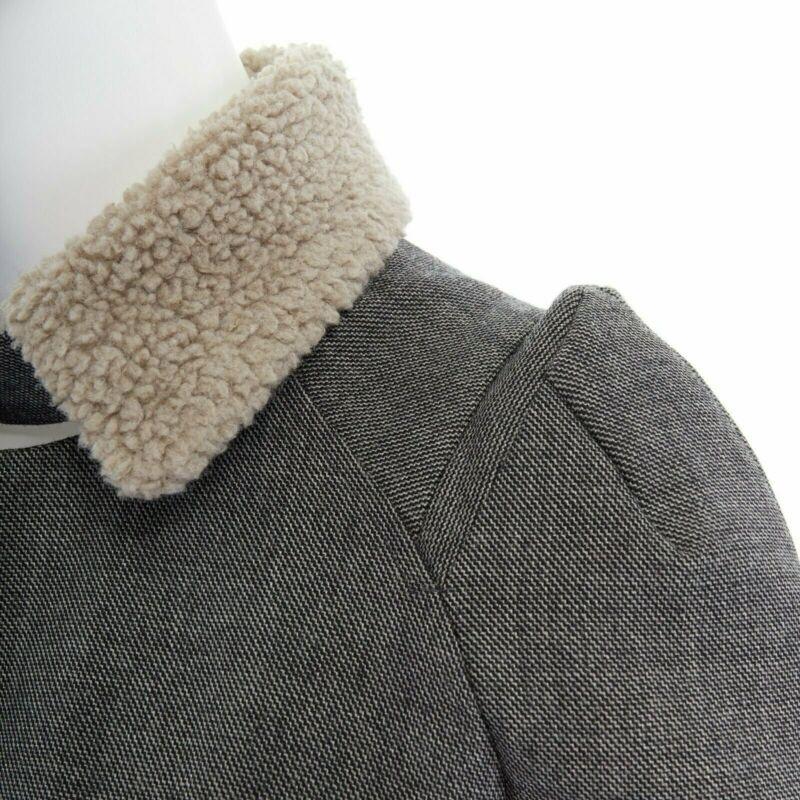 UNDERCOVER shearling collar padded cashmere wool hybrid belted coat JP1 S
Reference: CAWG/A00156
Brand: Undercover
Collection: Fall Winter 2008
Material: Wool
Color: Grey
Pattern: Other
Closure: Zip
Extra Details: 
Wool, nylon, cashmere polyester,