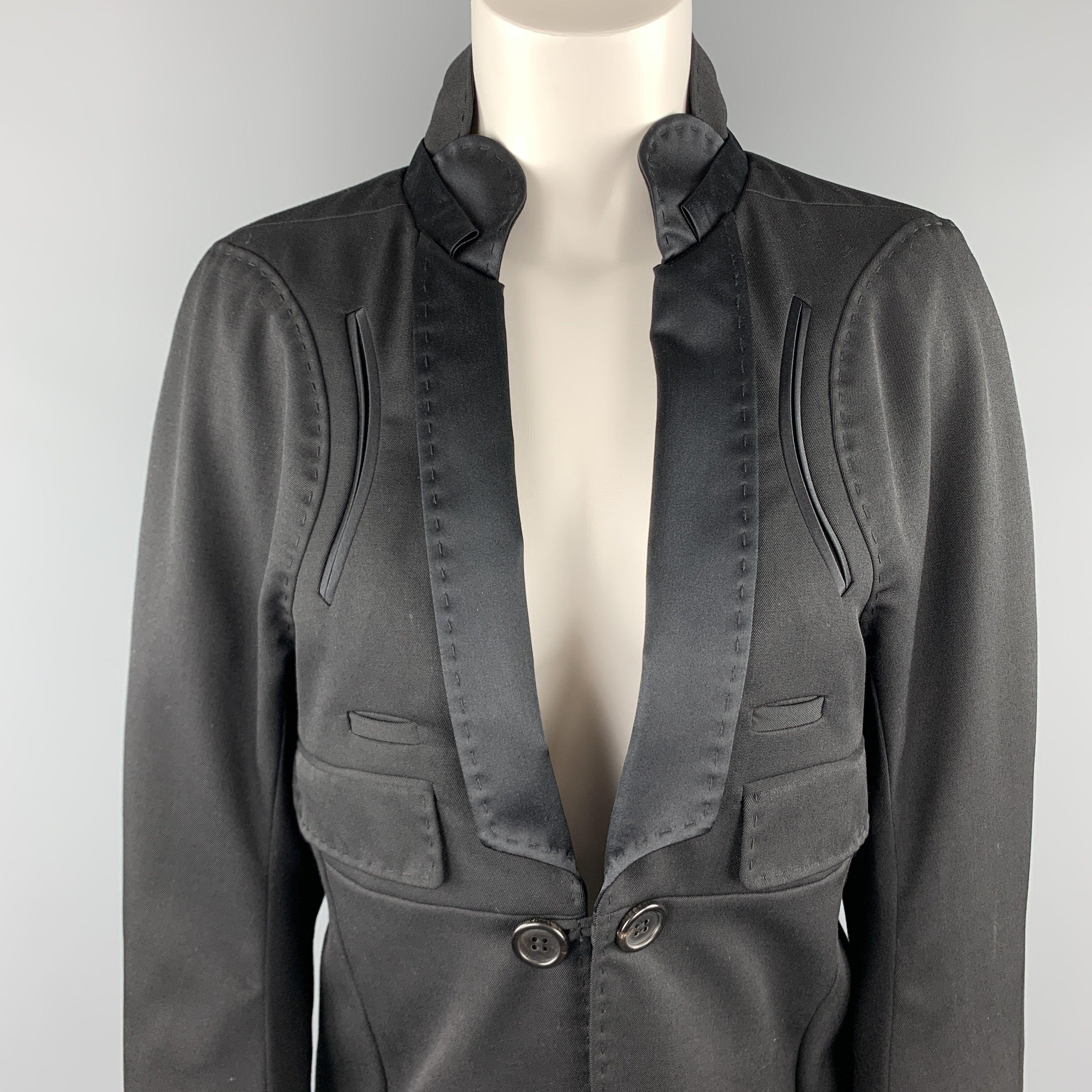 UNDERCOVER tuxedo style coat comes in black wool with a single button front, high back collar with satin shawl lapel, pocket details, and coat tail style hem line. Made in Japan.Excellent
Pre-Owned Condition. 

Marked:  JP 3 

Measurements: 
