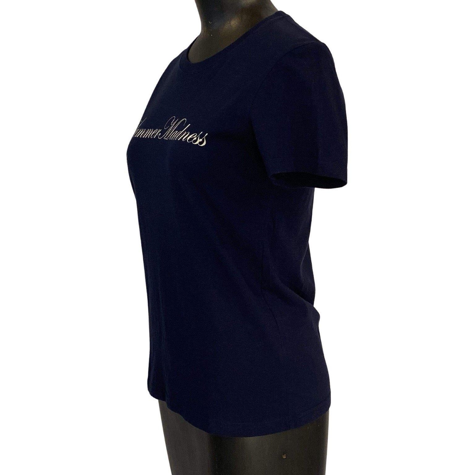 This vintage Undercover tee is 100% cotton. The deep navy blue is a good base for the feminine white font proclaiming 