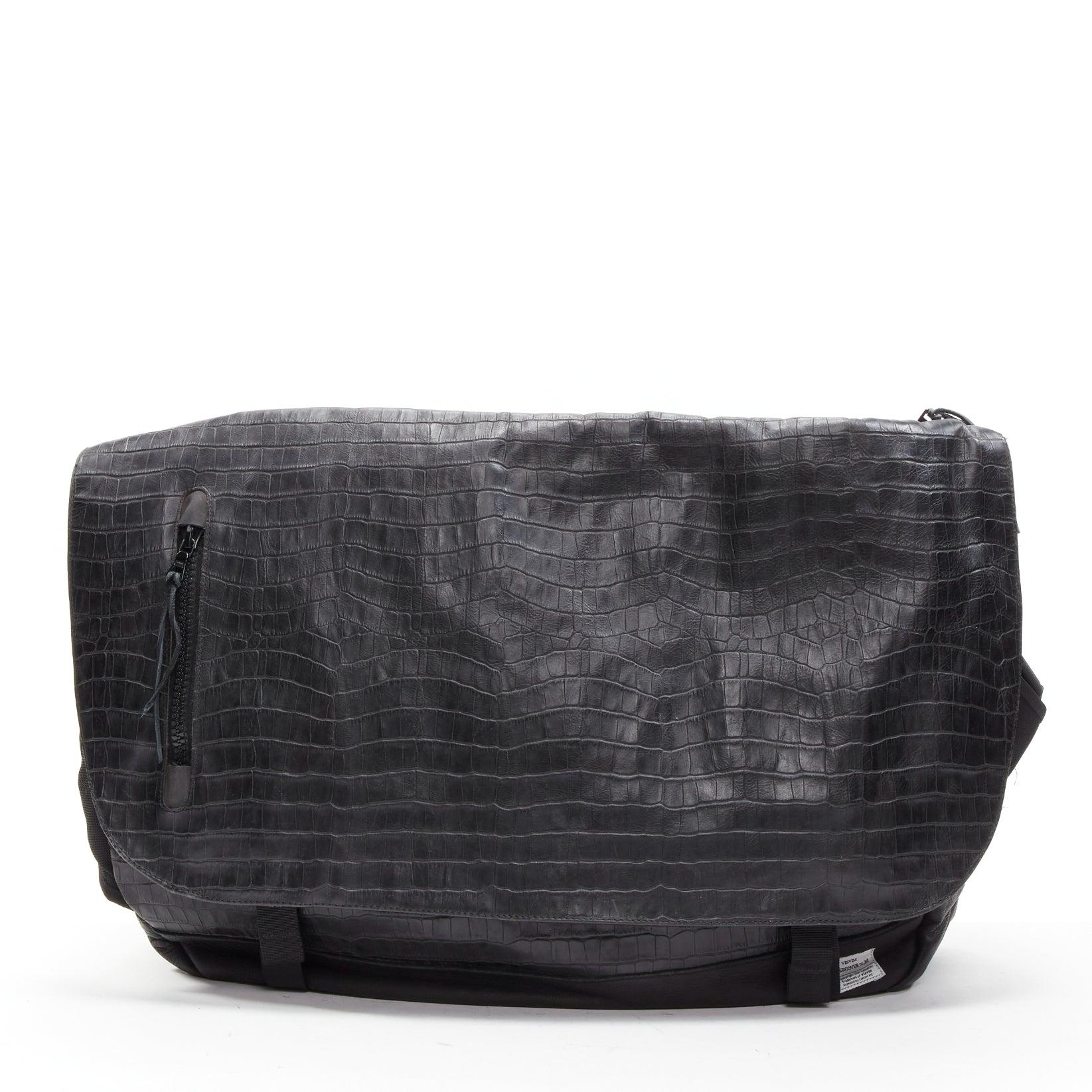 UNDERCOVER VISVIM 2007 Ballistic E-Cat black croc embossed oversized crossbody bag
Reference: CAWG/A00251
Brand: Undercover
Model: Ballistic E-Cat
Collection: Visvim 2007
Material: Leather, Fabric
Color: Black
Pattern: Animal Print
Closure: