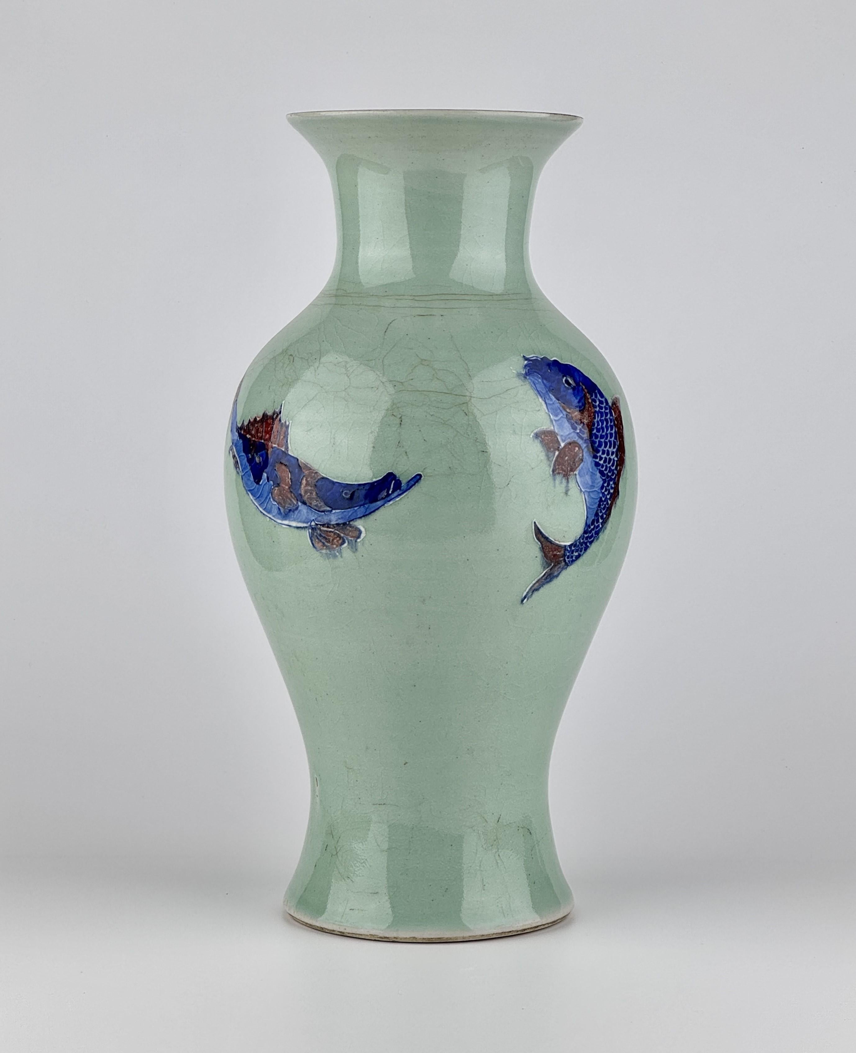 This Qing Dynasty Yuhuchunping features a soft pale green glaze applied evenly across its surface, exhibiting fine crackles that enhance its aged character. The vase has a gracefully curving silhouette, with broad shoulders tapering down to a narrow
