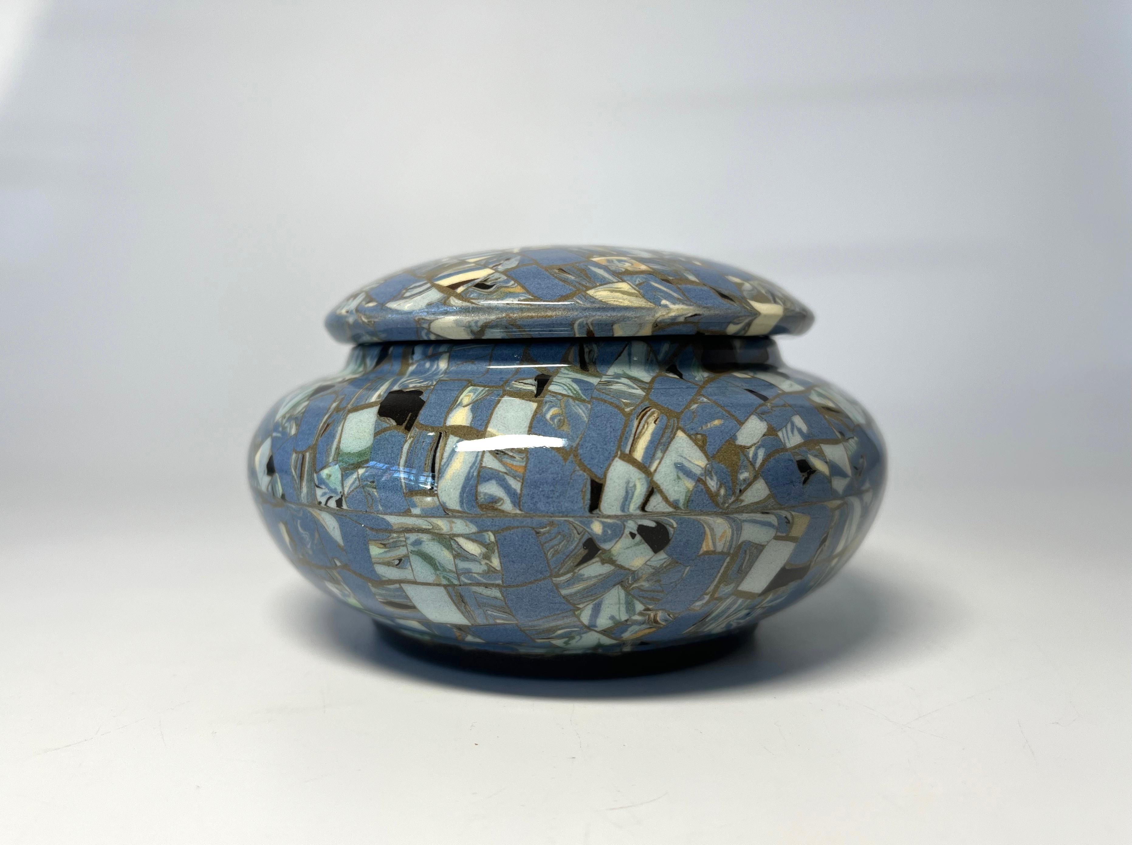 Quietly understated elegant Jean Gerbino for Vallauris, France, ceramic glazed pale blue mosaic lidded pot
Classic form and function with signature mosaic from Gerbino
Circa 1960's
Signed Gerbino  to base
Height 2.5 inch, Diameter 4.3 inch, 
In