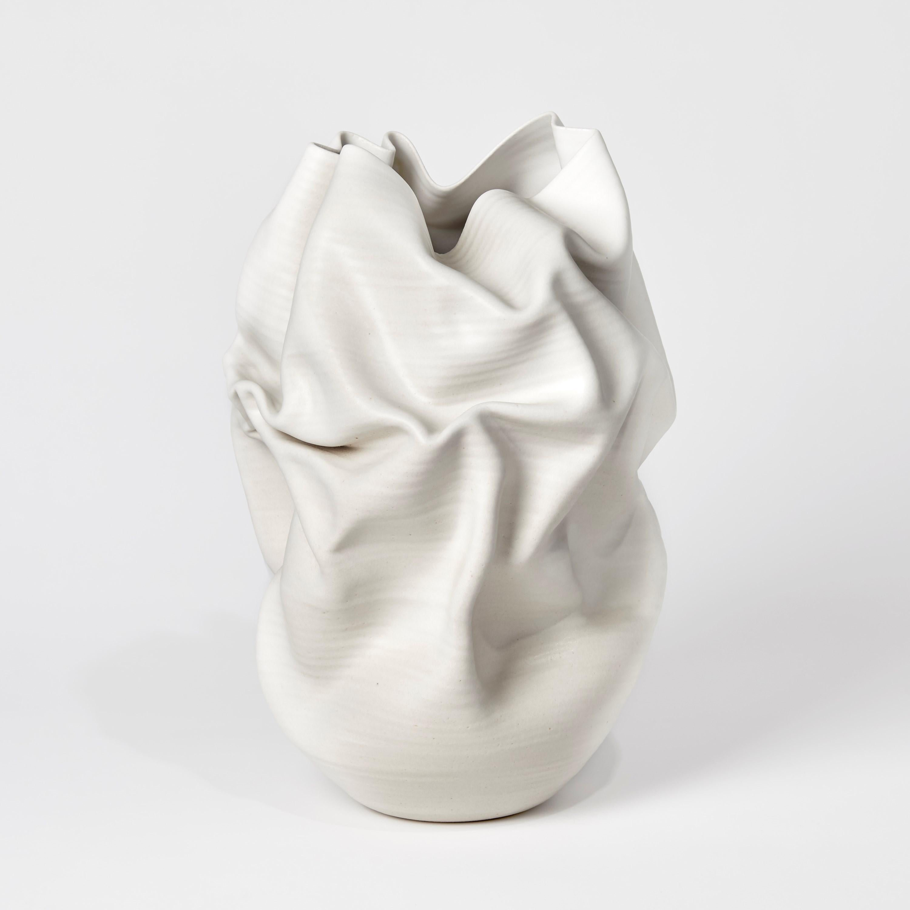 Undulating Crumpled Form No 51 is a unique ceramic sculptural vessel by the British artist Nicholas Arroyave-Portela, made from white St.Thomas clay with stoneware glazes.

Nicholas Arroyave-Portela’s professional ceramic practice began in 1994.