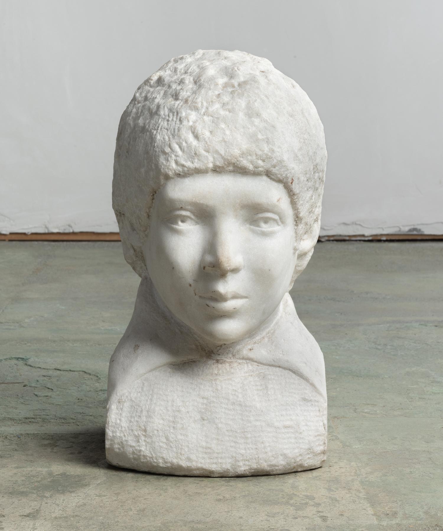 Marble bust, circa 19th century

Representation of a boy with a finely finished face and other roughly carved, un-finished elements.

This piece ships from Providence, Rhode Island.