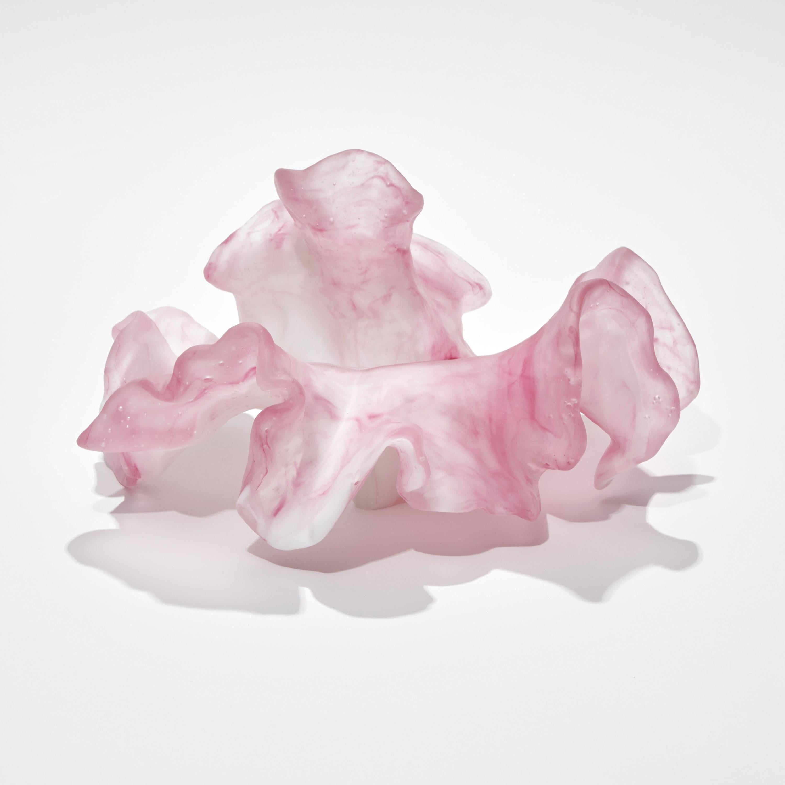 'Unfolded Change' is a unique cast glass sculpture by the Danish artist, Monette Larsen.

Larsen has always been fascinated by the concept of beauty within nature; what makes something beautiful and the characteristics that define it as such. Her