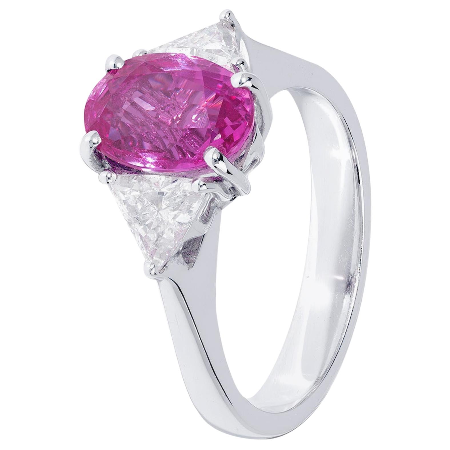 Unforgettable 3.20 Carat Pink Sapphire and White Diamond Three-Stone Ring For Sale