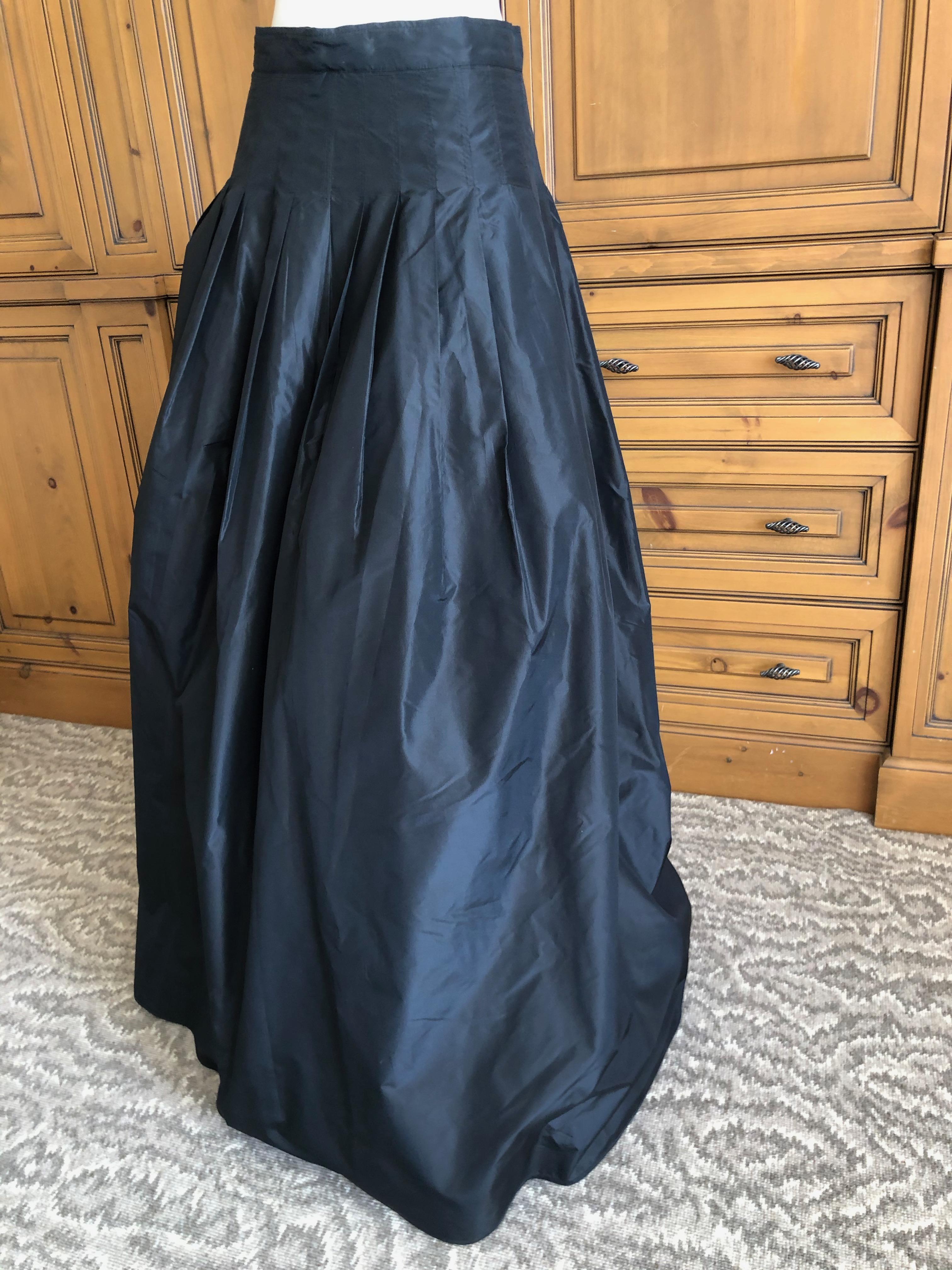 Ungaro Elegant Silk Taffeta Black Ball Skirt with Tulle and Horsehair Underskirt
Deep pleats, so beautiful.
 Sz 12 in the 80's is more like an 8 now
 Waist 28