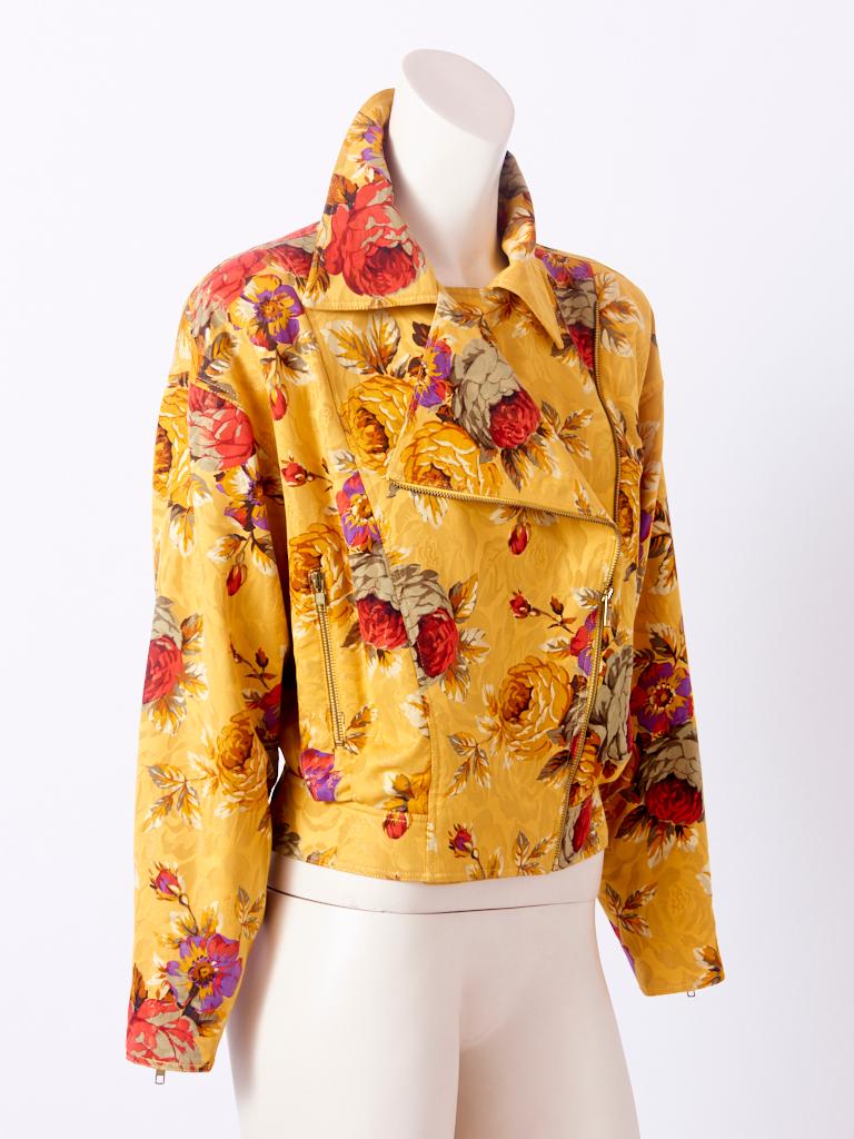 Ungaro, multi tone, damask, vivid, floral pattern, bomber jacket having wide lapels and a zippered closure.