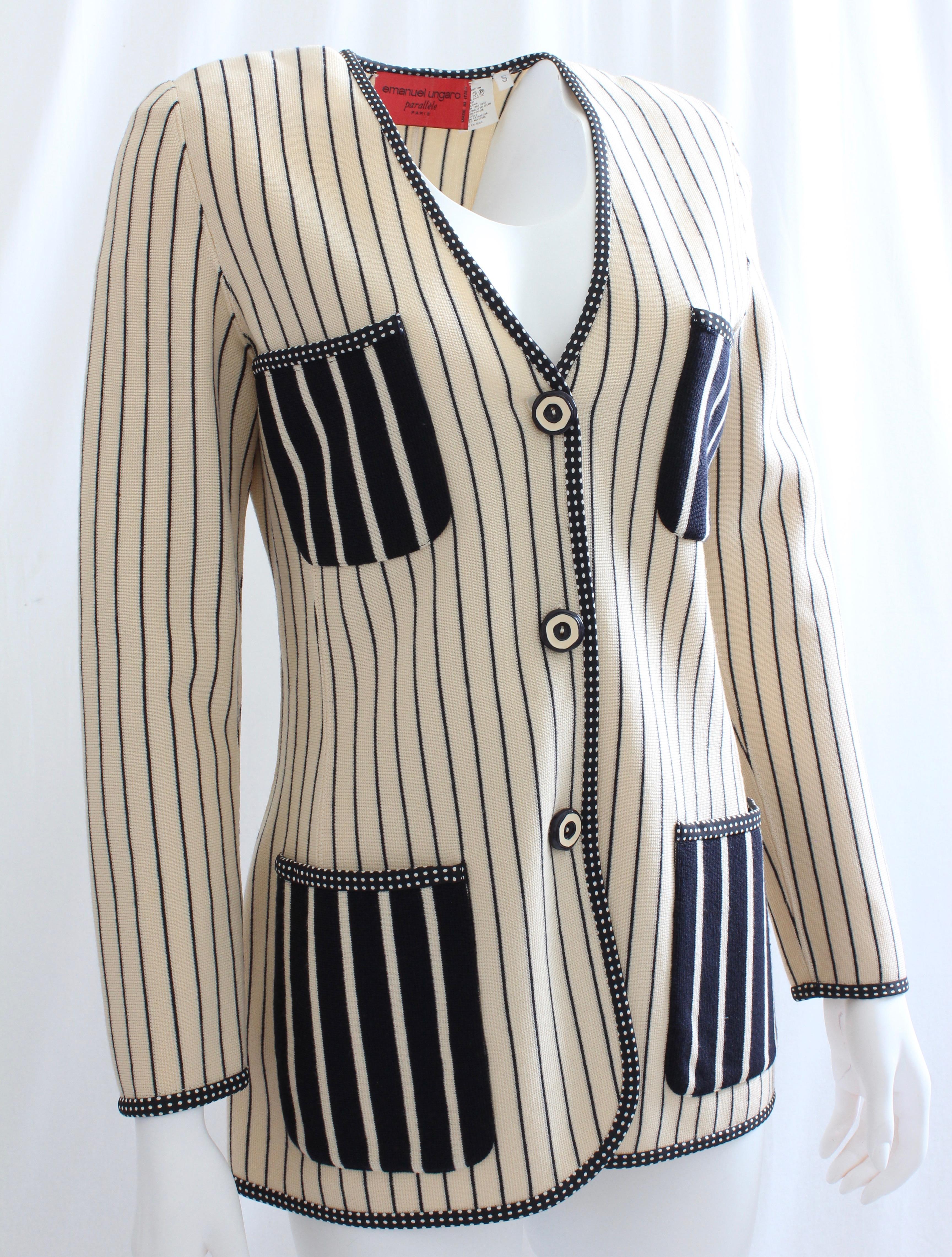 Here's a whimsical striped sweater jacket from Ungaro for their Parallele line.  Made from what we believe is a wool blend knit (no content label) this piece is unlined  with shoulder pads, and fastens with three buttons.  Preowned with signs of