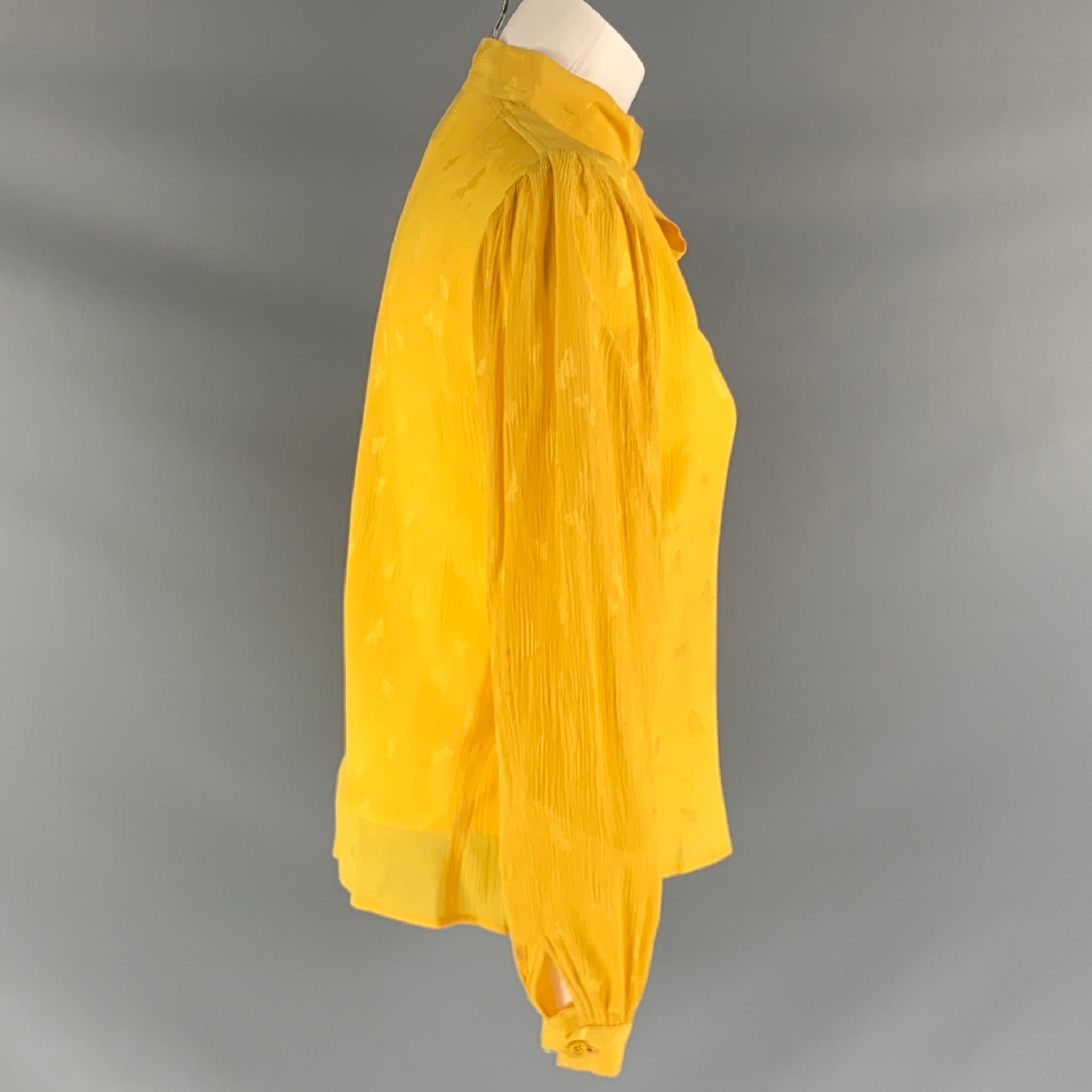 yellow long sleeve blouse