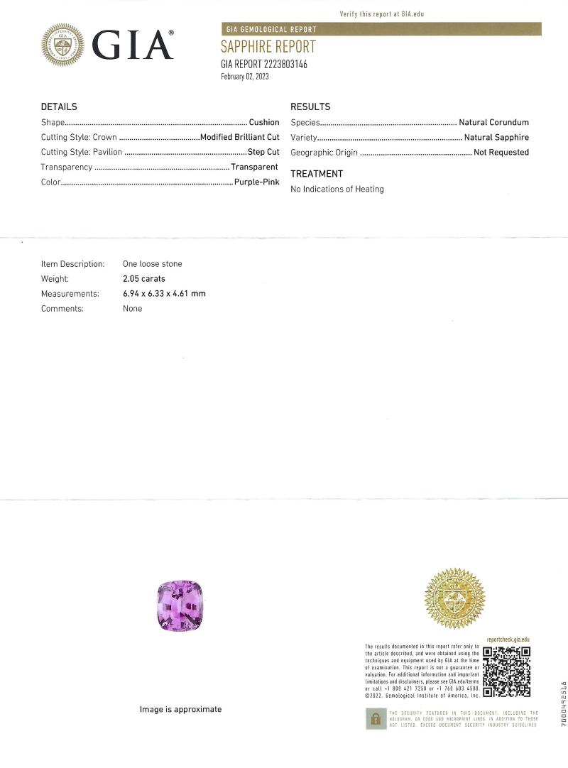 New platinum custom Ceylon sapphire ring containing a cushion cut natural rich pink sapphire measuring 6.94 x 6.33 x 4.61 mm and weighing 2.05 carat. Type II. medium light, moderately strong, slightly purplish red color, GIA slpR 4/4. Set with 56