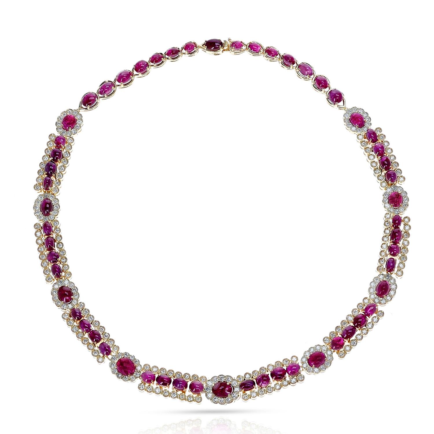 A stunning Unheated Burma Star Ruby Cabochon and Diamond Necklace, part of a set which includes earrings and two pendants. Please contact us for more information on the set. Length: 16.75