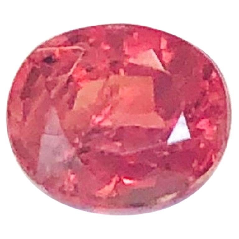 This unheated petite padparadscha packs a punch with its unusually intense natural color. Padparadscha sapphires are highly coveted and prized for their unique and elegant blend of pink and orange hues. Sapphires are usually heat-treated to coax out