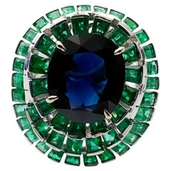 Unheated Blue Sapphire, Emerald and Diamond Ring set in 18K White Gold Settings