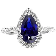 Zafiro azul sin calentar de 2,38 ct en anillo de platino con diamantes /Informe GIA