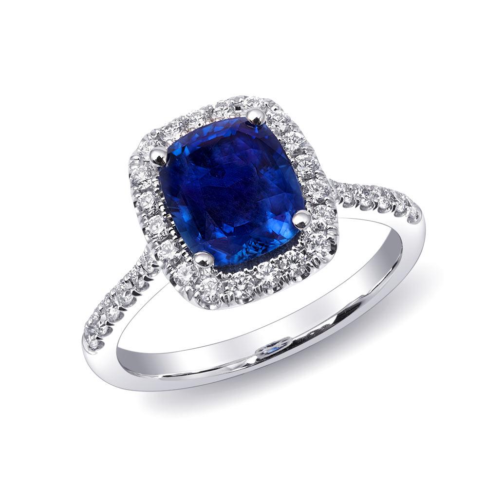 Uncover the elegance of this 14K white gold ring, featuring a stunning natural unheated blue sapphire accented with brilliant diamonds. The rich blue hue of the sapphire, highlighted by the sparkling diamonds, makes this ring an exquisite choice for