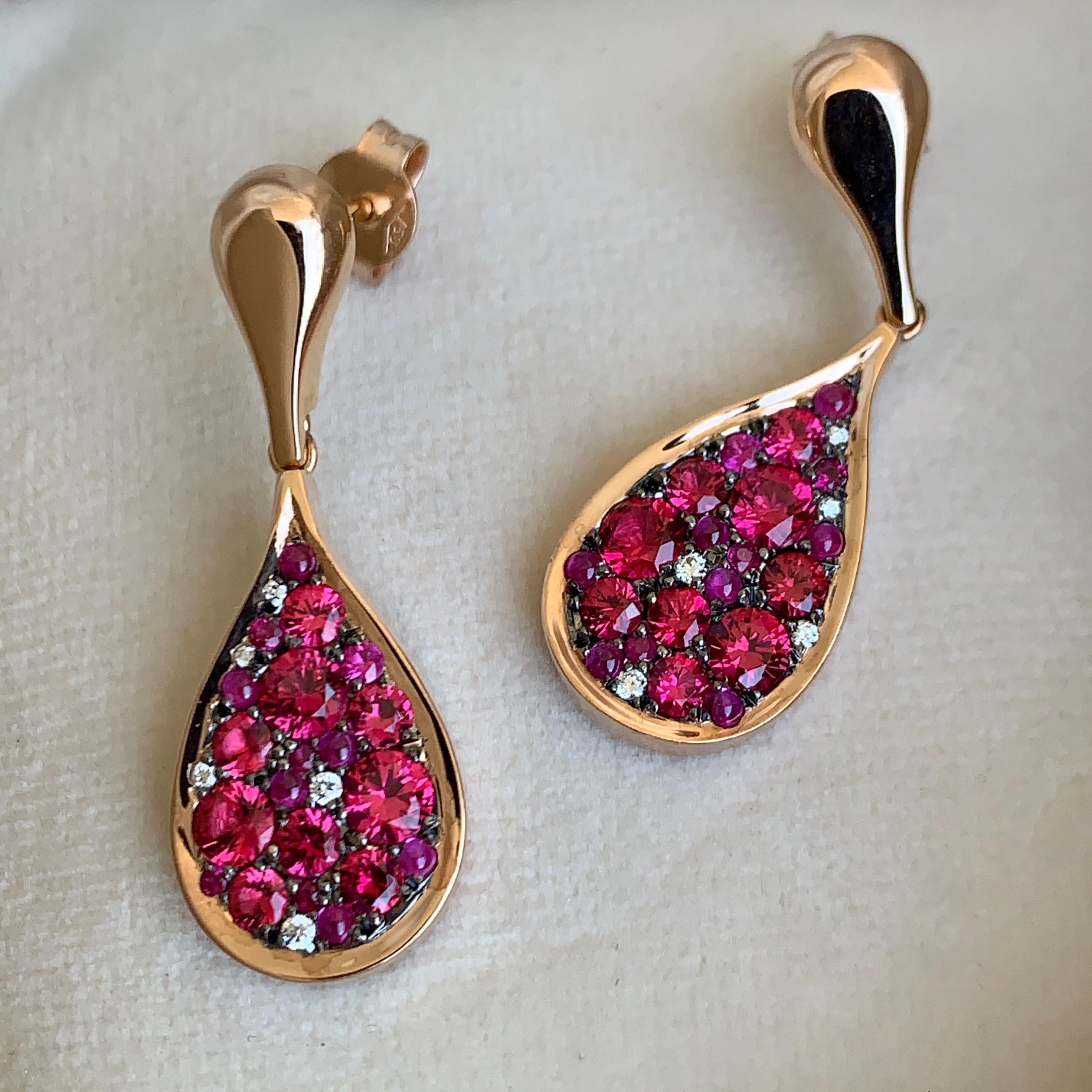 One of a kind earrings handmade in Belgium by jewelry artist Joke Quick in 18K rose gold 6,9 g & blackened sterling silver 3.3 g (The stones are set on silver to create a black background for the stones) Pave set with unheated Burmese intense Red (