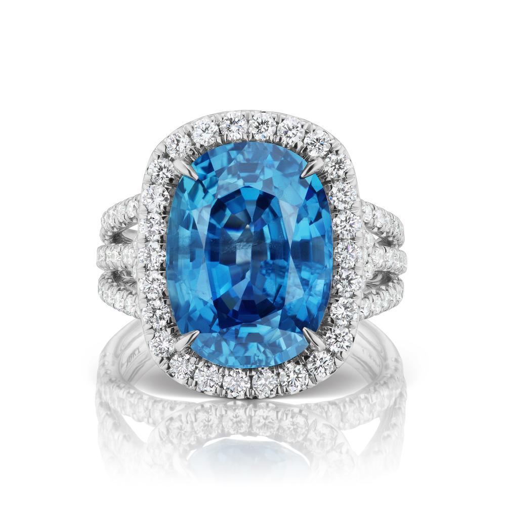 UNHEATED BURMA BLUE SAPPHIRE RING WITH DIAMONDS
An exquisite snowy diamond halo surrounds a clear blue sapphire.Sapphire is Burmese & UN-Heated with GRS Certificate.
Item:	# 03397
Setting:	18K W
Lab:	GRS
Color Weight:	12.14 ct. of Sapphire
Diamond