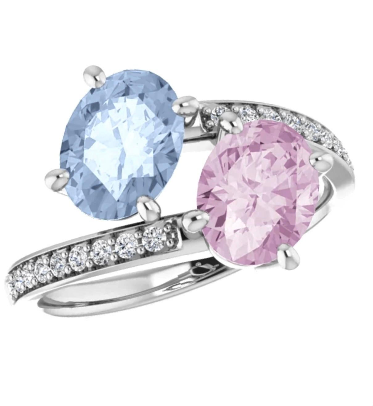 ***Made to order to your finger size, custom options are available, don't hesitate to inquire***
Inseparable, unheated fancy oval blue and pink Sapphire mismatched pair, totaling 2.44 carats, are decorated with round brilliant diamonds, totaling