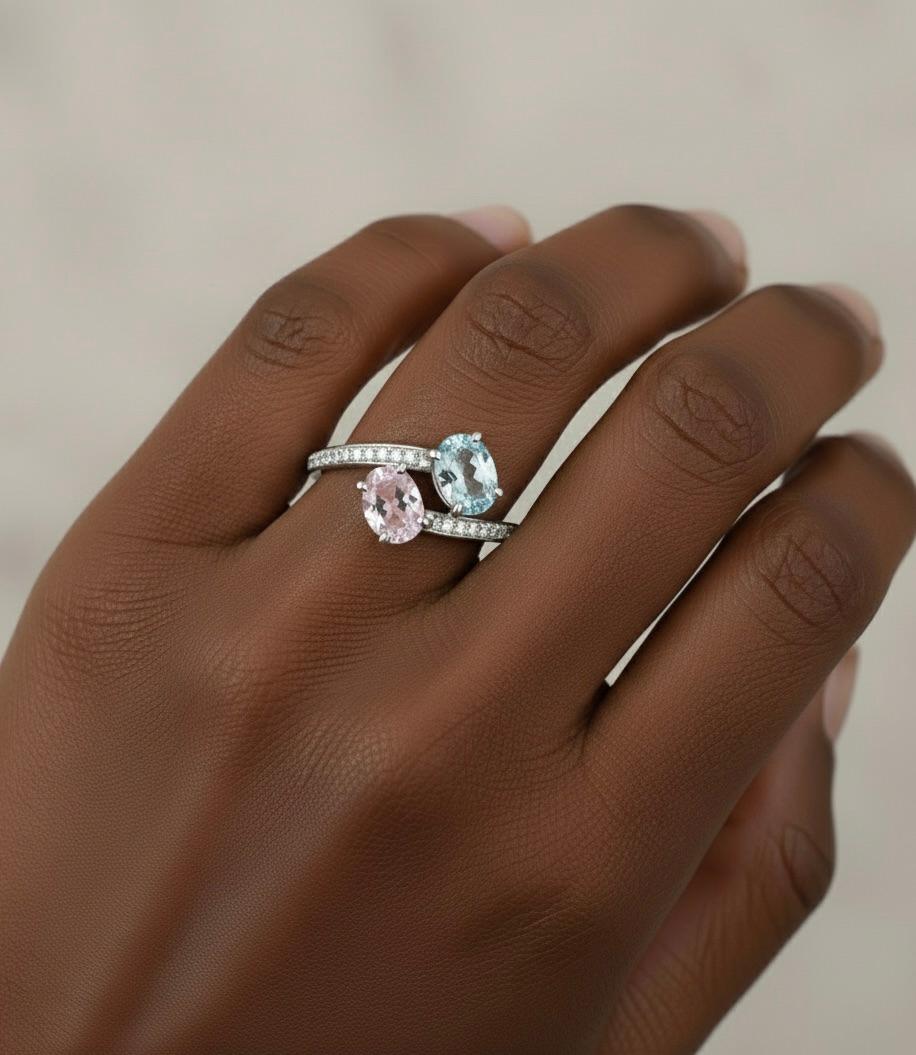 ***Made to order to your finger size, custom options are available, don't hesitate to inquire***
Inseparable, unheated fancy oval blue and pink Sapphire mismatched pair, totaling 2.44 carats, are decorated with round brilliant diamonds, totaling