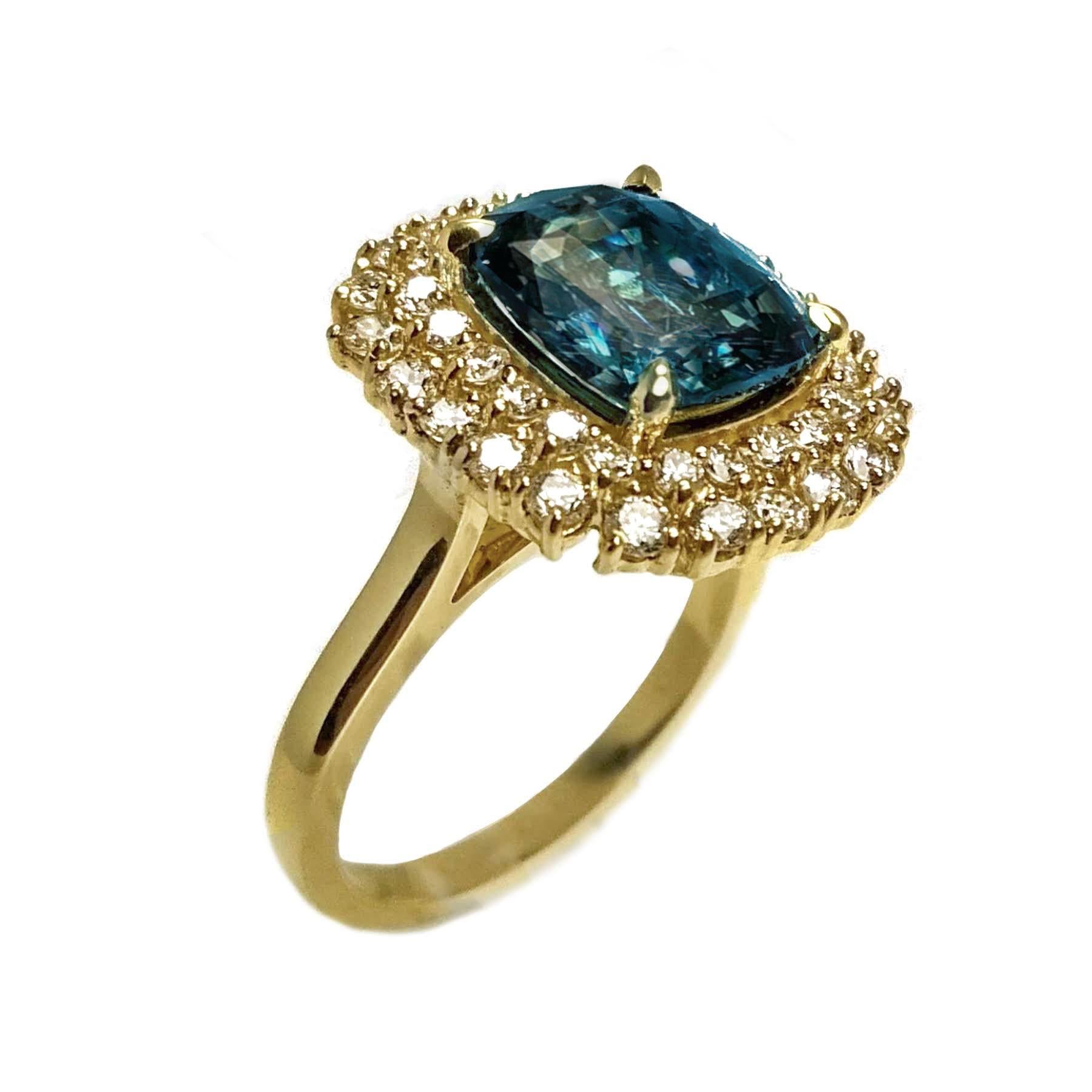 Rare, unheated greenish-blue sapphire and diamond ring. High luster, cushion modified brilliant, unheated greenish-blue 3.95 carats sapphire with GIA, encased in basket mounting, set in high profile with four knife prongs, accented with two rows of
