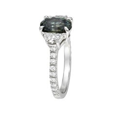 2.58 Carat Unheated Green Sapphire Oval Three Stone Platinum Engagement Ring