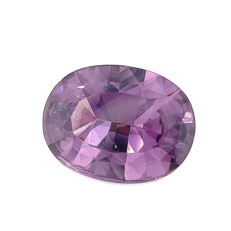 This beautiful 3.91 carat lavender purple spinel will make a stunning ring or pendant! It is a sparkling, crystalline gemstone with gorgeous, subdued pinkish purple color and grape and plum highlights. Measuring 11.97 x 9.19 x 4.92mm, this pretty