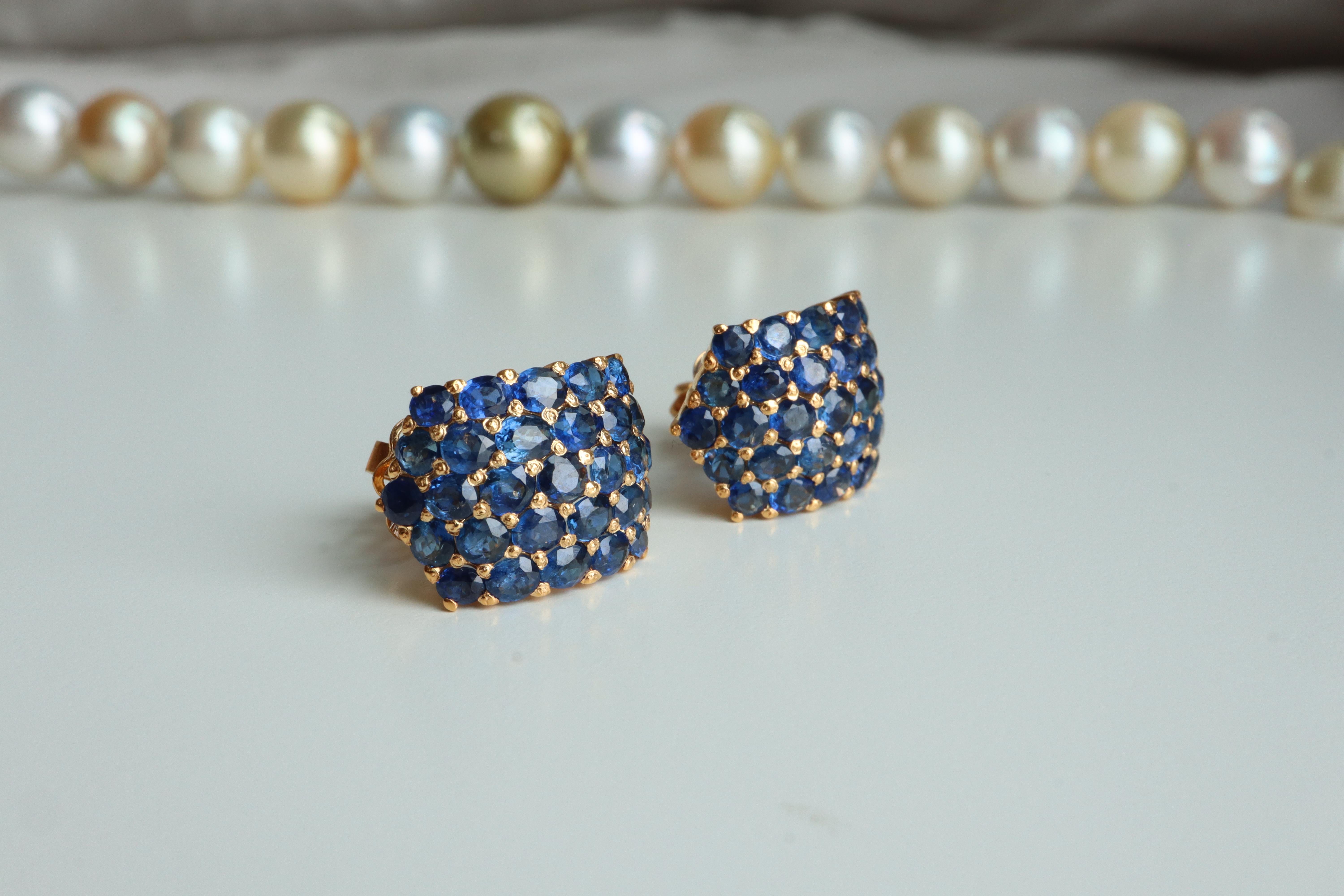 Unheated sapphire earring Singapore

These vintage-inspired chunky sapphire earrings feature 58 natural, unheated Mogok sapphires in rich blue tones, meticulously crafted in 18k solid gold with a bold dome silhouette. A hidden hook at the base