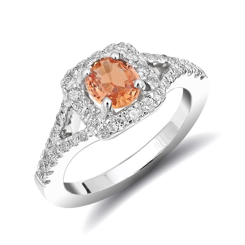 Discover the vibrant allure of this exquisite 14K white gold ring, featuring a natural unheated orange sapphire accented with sparkling diamonds. The intense orange hue of the sapphire, combined with its excellent clarity and expert cut, makes it a