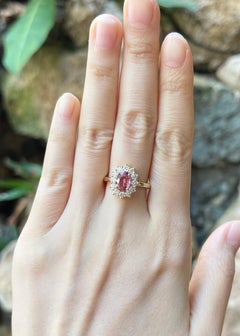 Unheated Padparadscha Sapphire with Diamond Ring set in 18K Gold Setting