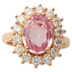 Bague en or rose 18 carats sertie de saphirs padparadscha non chauffés et de diamants