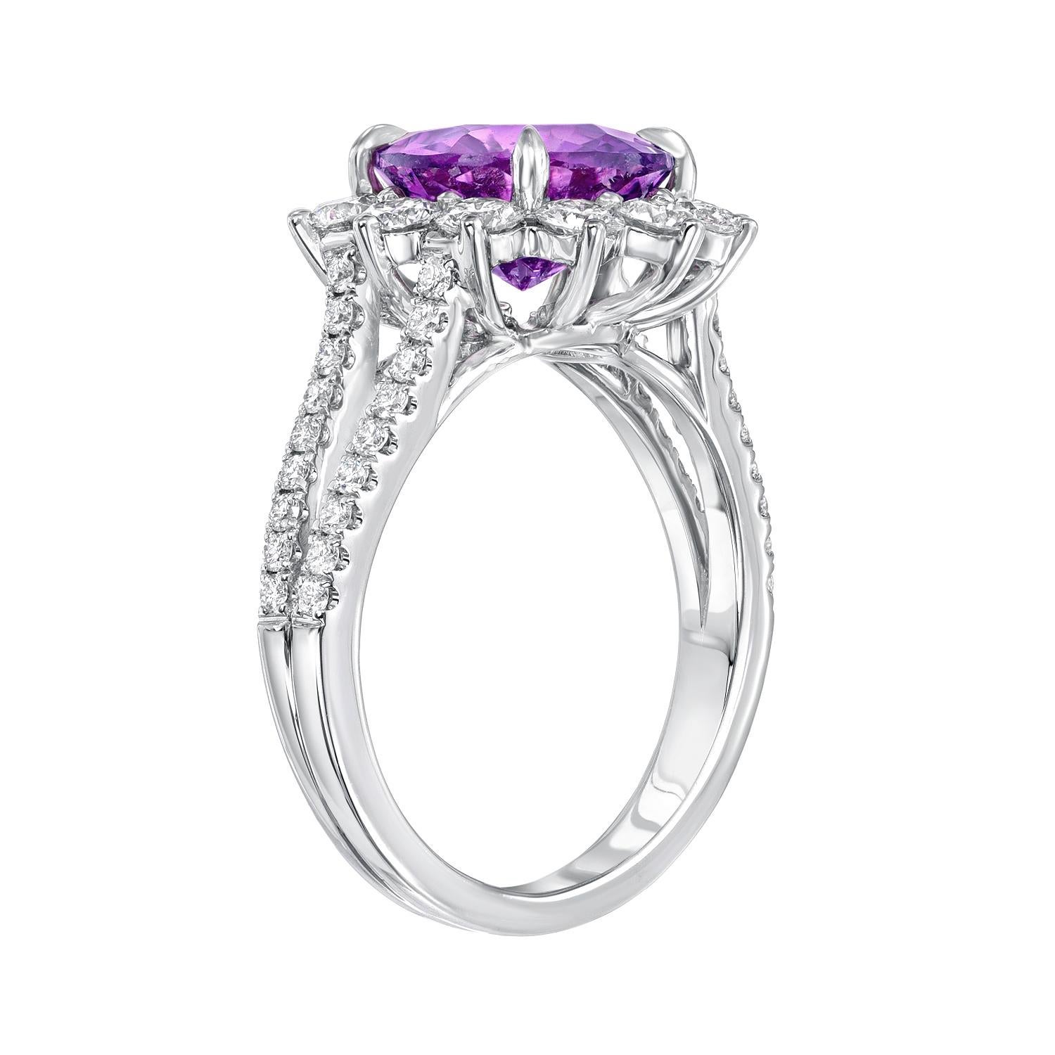 Unheated 3.58 carat Pinkish Purple Sapphire round, 18K white gold ring, surrounded by round brilliant diamonds weighing a total of 1.22 carats.
Ring size 6.5. Resizing is complementary upon request.
Crafted by extremely skilled hands in the
