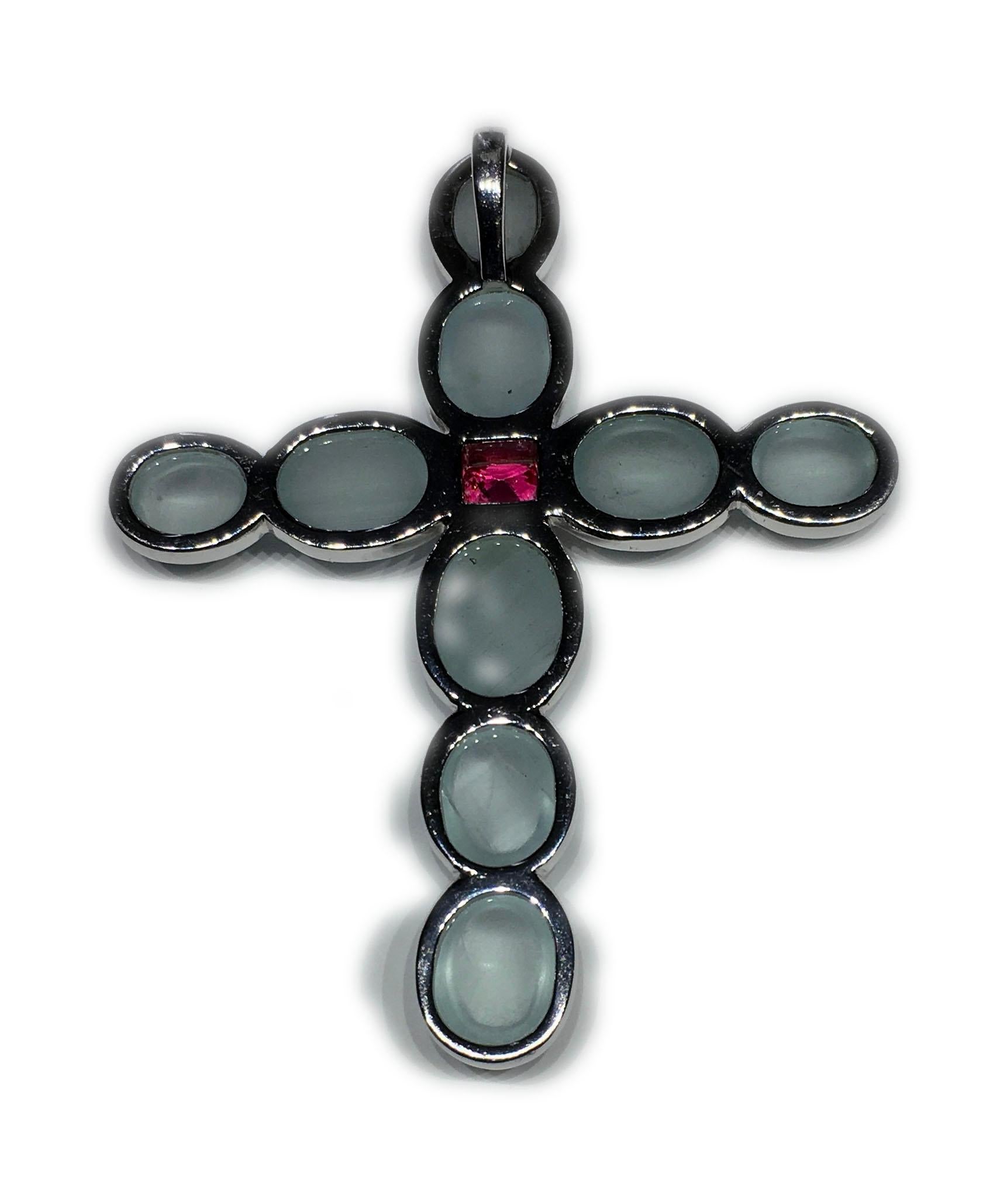 Modern A Silver Cross Pendant set with Milky Aquamarine & an Unheated Pink Sapphire. For Sale