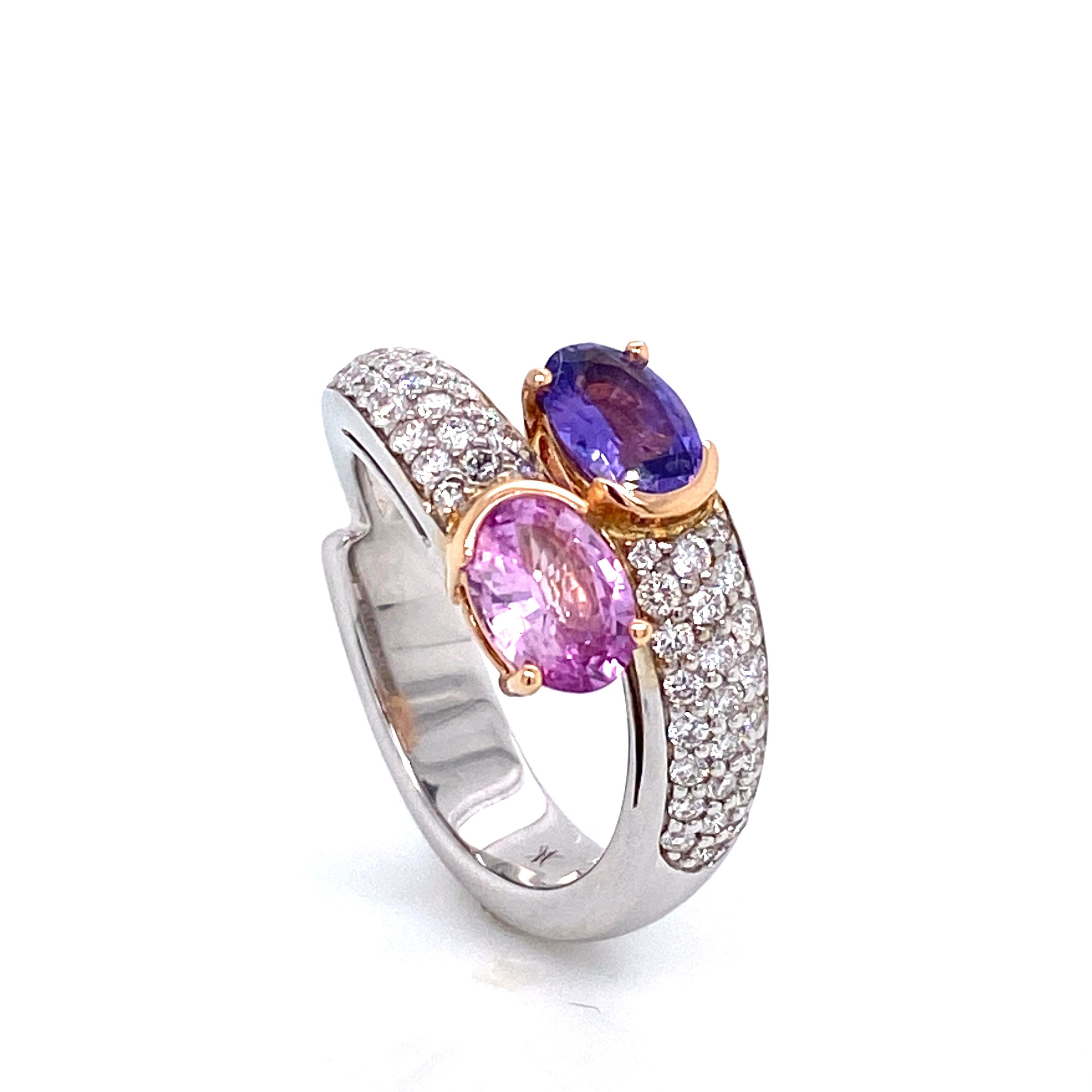 Pink Sapphire, Diamonds on white and Rose gold 18 k Bicolor Ring
White Gold and Rose Gold 18 K 
Weight Of Gold : 7.28 grams 
2 Unheated Sapphire Pink and Violet Color 1.65 cts 
48 Diamonds 0.49 cts 
French Size : 53.5
US Sise : 6 3/4
British Size :