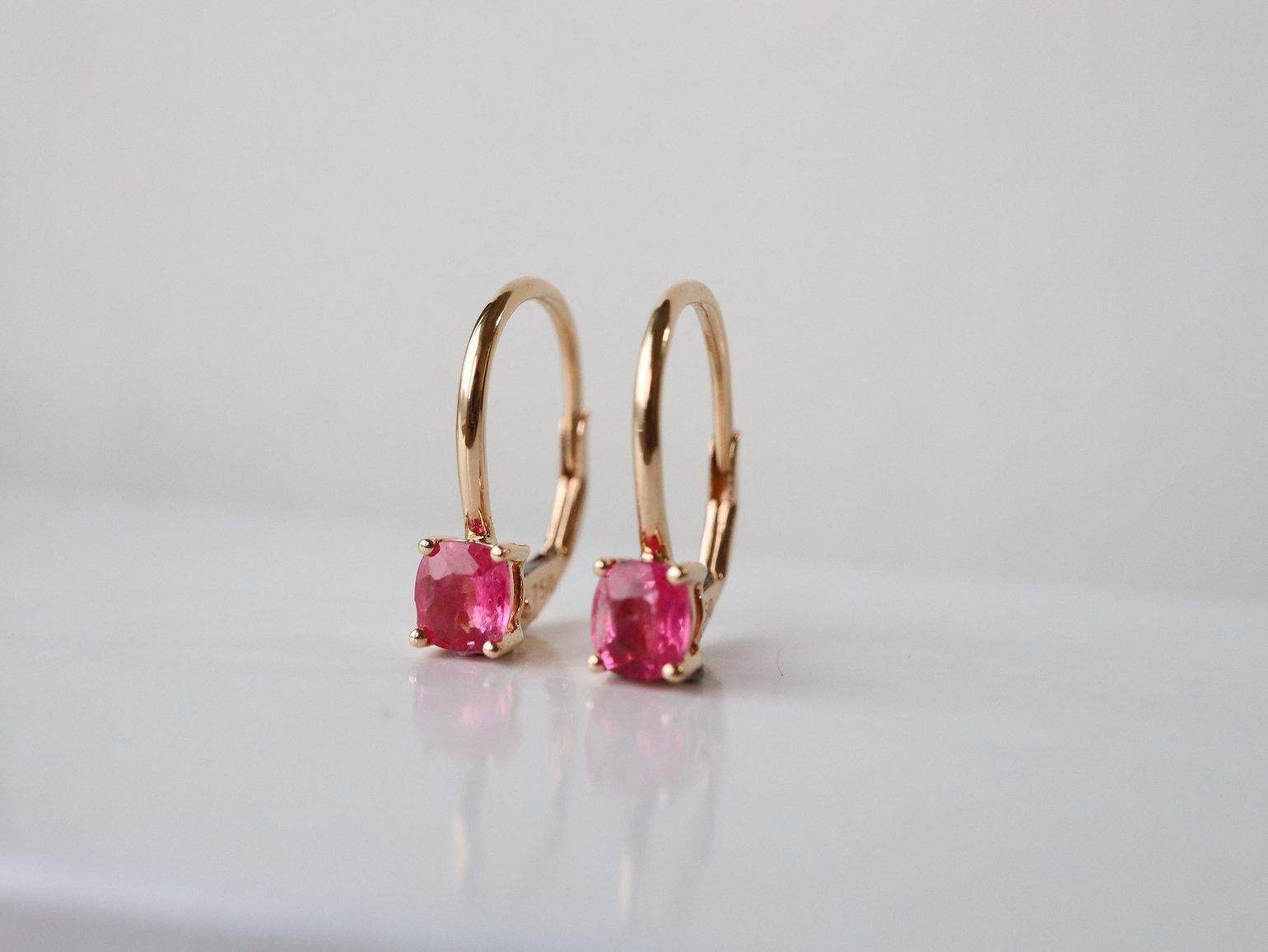 Leverback earrings are versatile and trendy ear jewelry suitable for both casual and formal occasions. Featuring a hinged lever in the closure mechanism, they provide a secure clasp at the back. Set with natural gemstones such as rubies, sapphires,