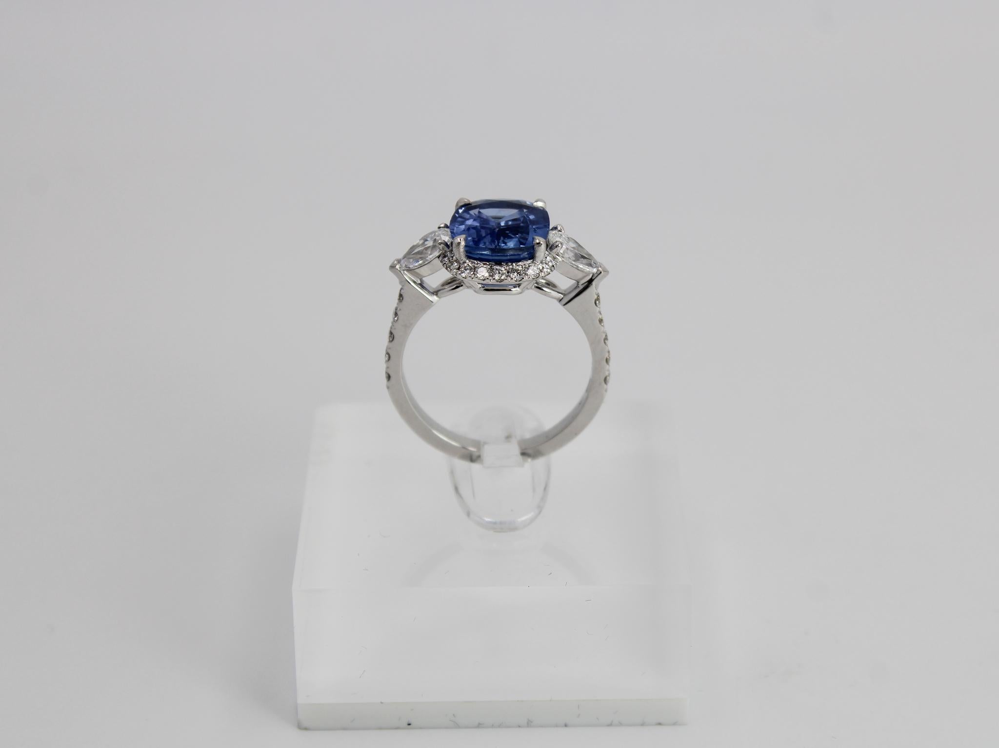 Oval Cut Unheated Royal Blue Sapphire 2.05 ct Ring in 18K White Gold with Diamonds For Sale
