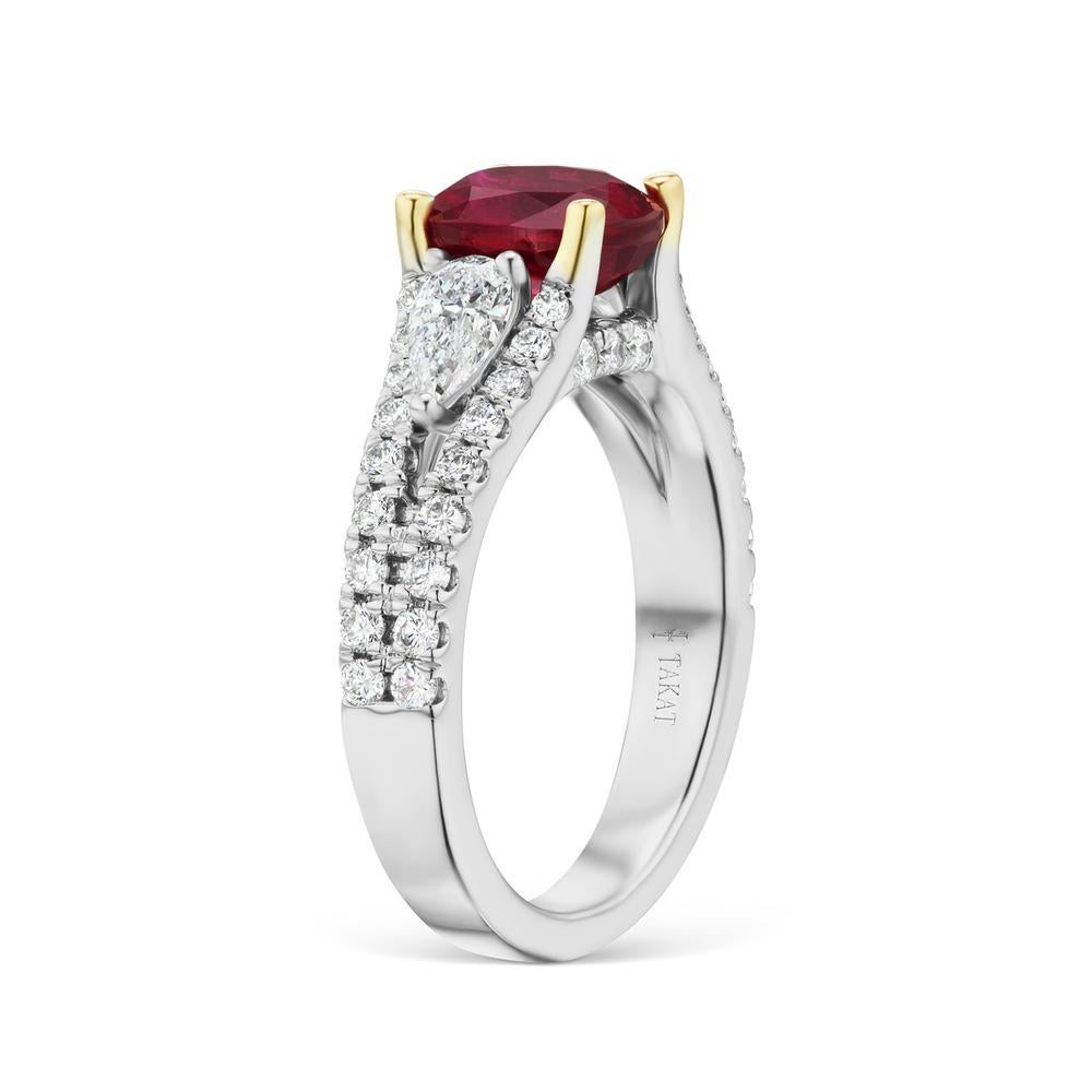 UNHEATED RUBY RING BY RAYAZTAKAT
More dynamic than a classic three stone ring, this ring features two pear shaped side diamonds, surrounded by a delicate split diamond band. Unheated Mozambique Ruby 2.36cts, Certified By GRS Lab And its Pigeon Blood