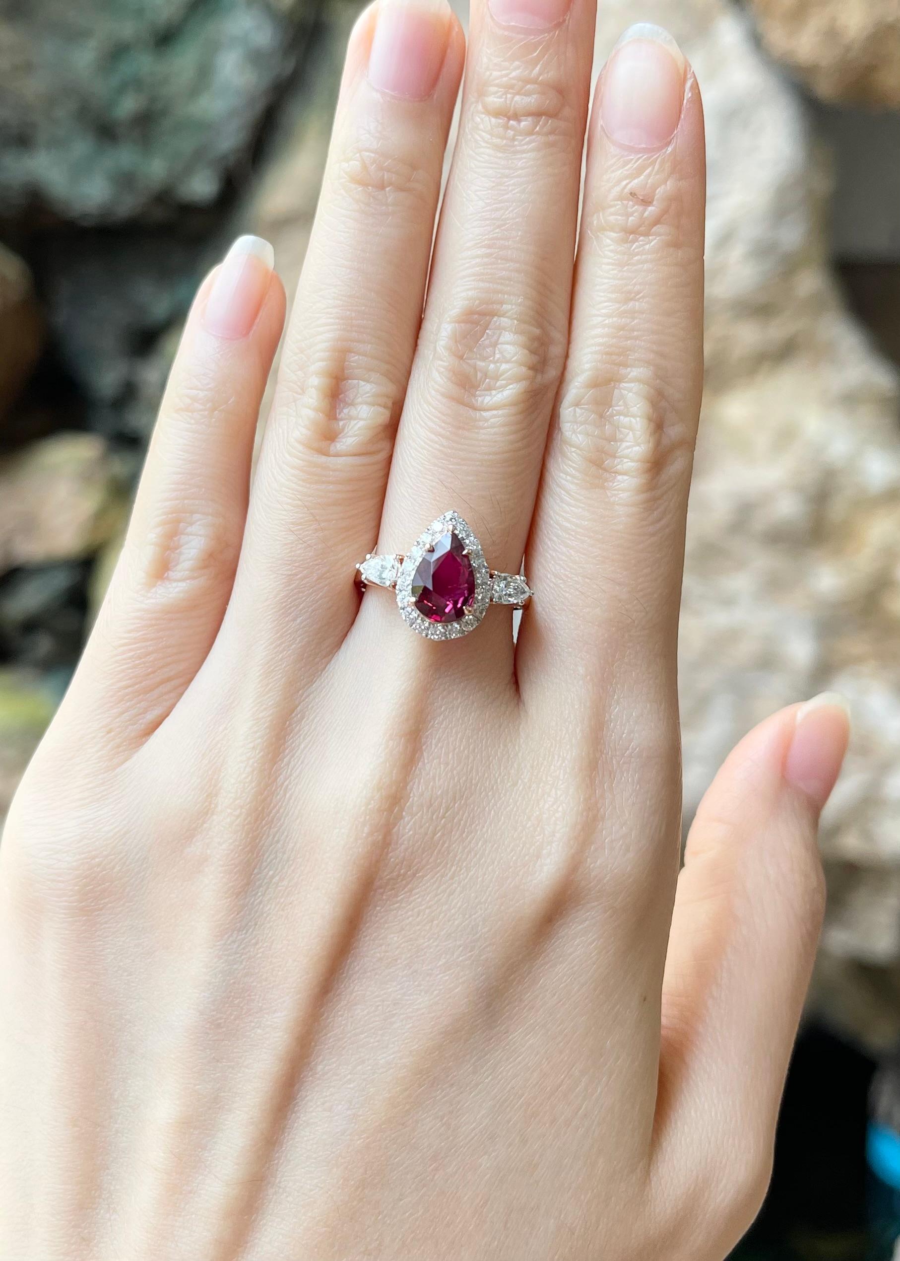 Unheated Ruby 2.11 carats with Diamond 0.38 carat and Diamond 0.31 carat Ring set in 18K Rose Gold Settings

Width:  1.0 cm 
Length: 1.4 cm
Ring Size: 54
Total Weight: 5.80 grams

