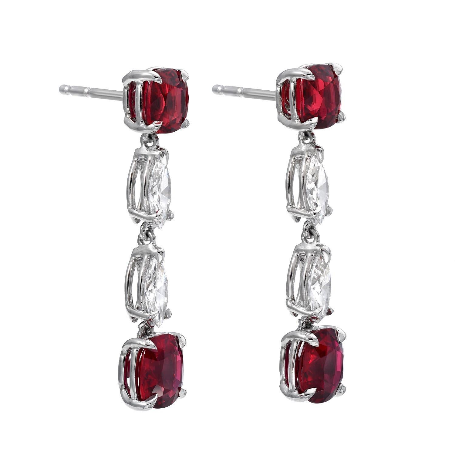 Exceptional GIA certified, natural, unheated Ruby and diamond earrings in platinum. 
This exclusive Ruby set, weighs a total of 4.35 carats; 2.06 carats on the top, and 2.29 carats on the bottom. The marquise shaped diamonds total 0.86 carats.
The