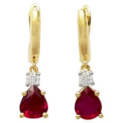 Boucles d'oreilles en or 18k avec diamants et rubis non chauffés