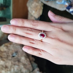 Unheated Ruby with Diamond Ring set in 18K Gold Settings