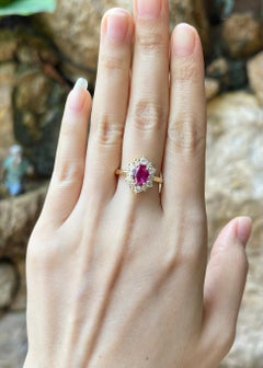 Unheated Ruby with Diamond Ring set in 18K Gold Settings