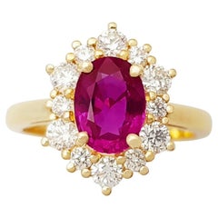 Anello con rubino non riscaldato e diamante con montatura in oro 18 carati