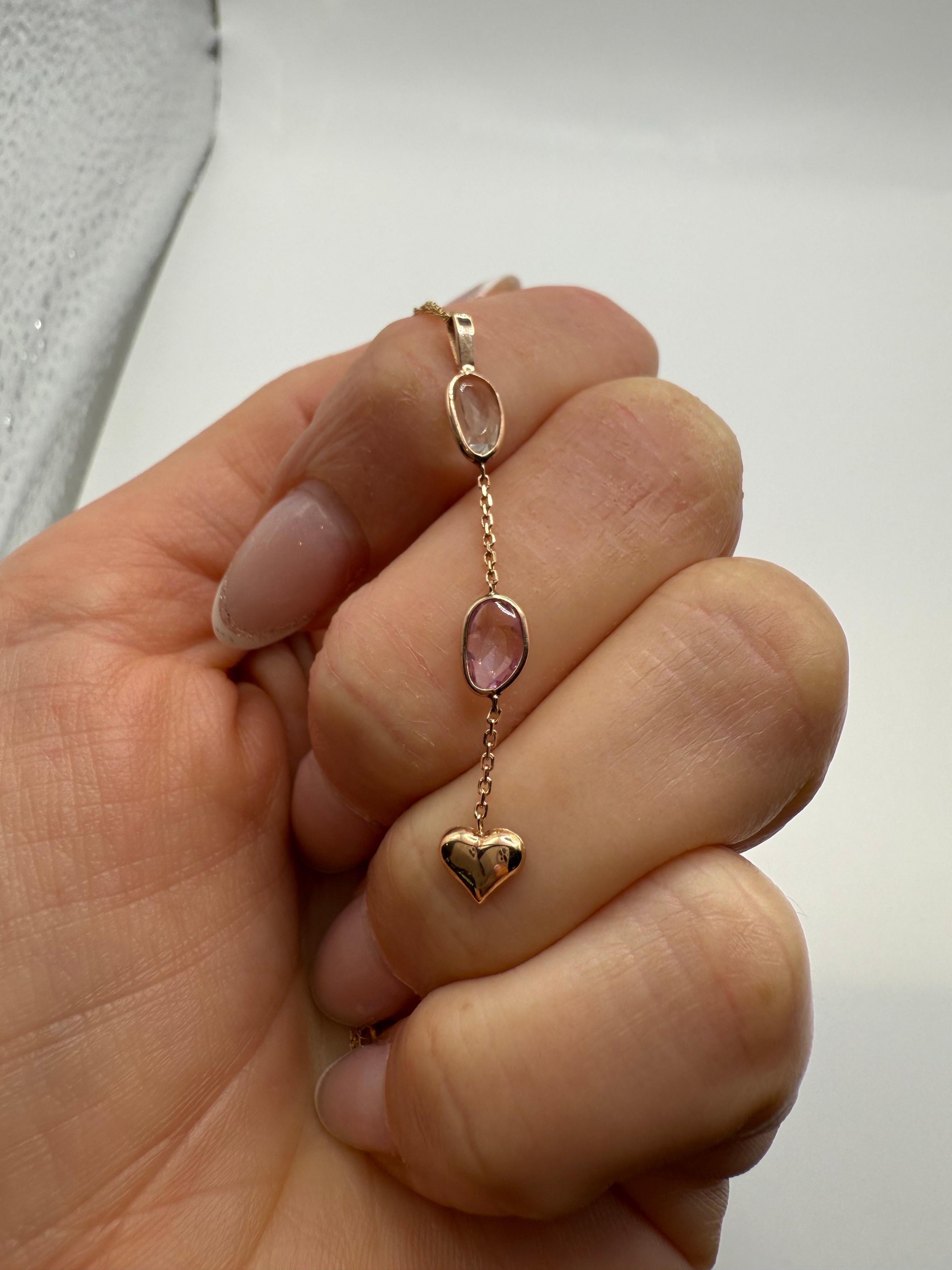 Long pendant necklace made with unheated yellow sapphire and unheated pink sapphire in 14KT gold, these are natural sapphires cut in rosecut shape with a small heart on the bottom, such a floral feathery piece, chain is 16 inches, 14KT gold

**All
