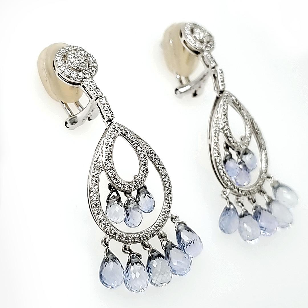 Unheated Sri Lankan Sapphire Briolette and Diamond Chandelier Earrings. (Our code EJ 494) 

A set of 16 unheated sapphire briolettes of Sri Lankan origin, weighing cts 10.75, decorate this chandelier earring that consists of two hoops of diamond