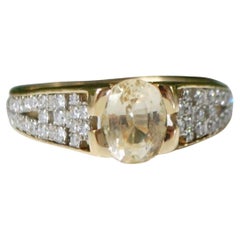 Bague en or 18 carats avec saphir jaune non chauffé et diamants