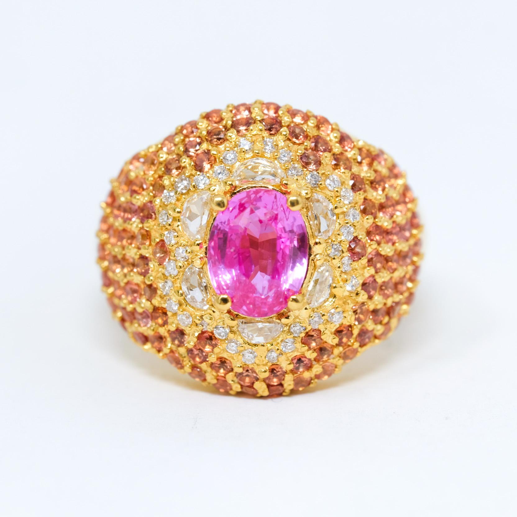 2.02 carat unheated bright pink sapphire
1 ct graduated custom cut half moon diamonds, vs, H color
approx 2.5 ct orange-peach sapphires
approx .75 ct 1.2mm brilliant vs diamonds, H color
18 K gold 